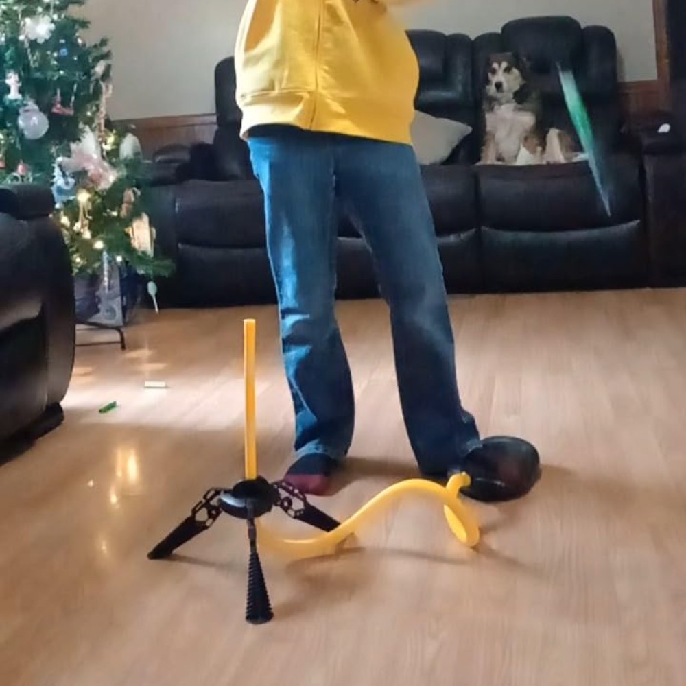 A foam air rocket on its foot-pump launcher